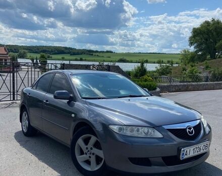 Серый Мазда 6, объемом двигателя 2 л и пробегом 285 тыс. км за 4500 $, фото 1 на Automoto.ua