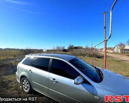 Серый Мазда 6, объемом двигателя 2 л и пробегом 300 тыс. км за 2600 $, фото 1 на Automoto.ua