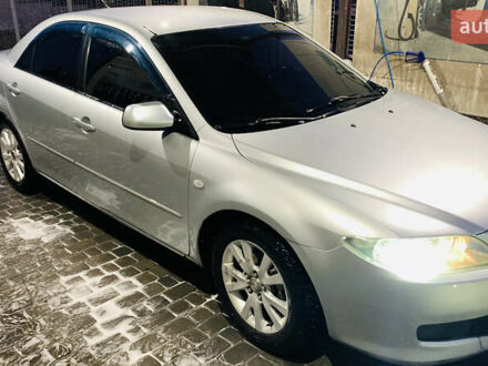 Серый Мазда 6, объемом двигателя 2 л и пробегом 205 тыс. км за 4300 $, фото 1 на Automoto.ua