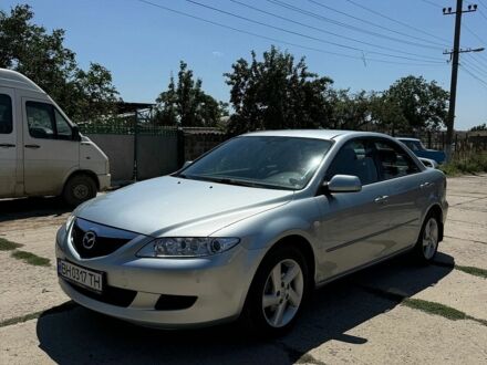 Серый Мазда 6, объемом двигателя 2 л и пробегом 145 тыс. км за 4400 $, фото 1 на Automoto.ua