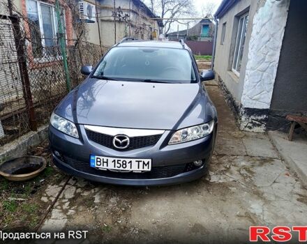 Серый Мазда 6, объемом двигателя 2 л и пробегом 338 тыс. км за 3600 $, фото 1 на Automoto.ua
