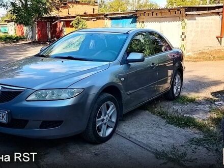 Серый Мазда 6, объемом двигателя 1.8 л и пробегом 306 тыс. км за 4000 $, фото 1 на Automoto.ua
