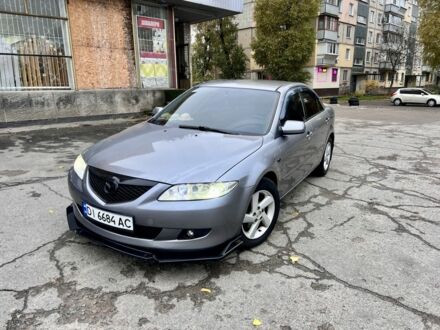 Сірий Мазда 6, об'ємом двигуна 2 л та пробігом 230 тис. км за 4999 $, фото 1 на Automoto.ua