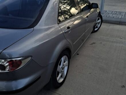 Сірий Мазда 6, об'ємом двигуна 2 л та пробігом 300 тис. км за 4200 $, фото 1 на Automoto.ua
