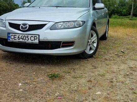Серый Мазда 6, объемом двигателя 1.8 л и пробегом 245 тыс. км за 4300 $, фото 1 на Automoto.ua