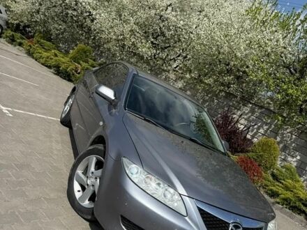 Серый Мазда 6, объемом двигателя 2 л и пробегом 230 тыс. км за 2500 $, фото 1 на Automoto.ua