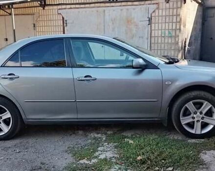 Серый Мазда 6, объемом двигателя 1.8 л и пробегом 306 тыс. км за 4000 $, фото 1 на Automoto.ua