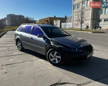 Серый Мазда 6, объемом двигателя 2 л и пробегом 336 тыс. км за 4000 $, фото 1 на Automoto.ua