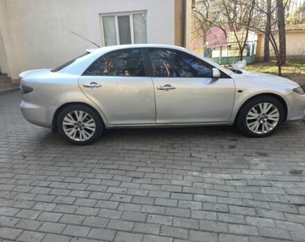 Серый Мазда 6, объемом двигателя 2 л и пробегом 250 тыс. км за 3600 $, фото 1 на Automoto.ua
