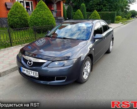 Серый Мазда 6, объемом двигателя 1.8 л и пробегом 234 тыс. км за 3850 $, фото 1 на Automoto.ua
