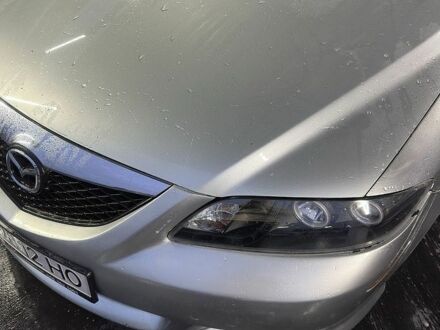 Серый Мазда 6, объемом двигателя 2 л и пробегом 250 тыс. км за 3091 $, фото 1 на Automoto.ua