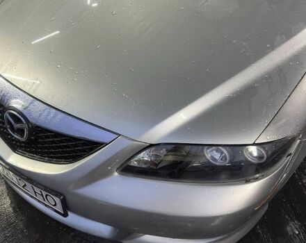 Серый Мазда 6, объемом двигателя 2 л и пробегом 250 тыс. км за 3091 $, фото 1 на Automoto.ua