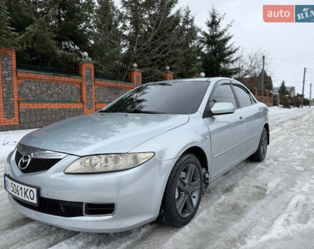 Серый Мазда 6, объемом двигателя 2 л и пробегом 318 тыс. км за 3999 $, фото 1 на Automoto.ua