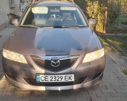 Серый Мазда 6, объемом двигателя 2 л и пробегом 180 тыс. км за 4200 $, фото 1 на Automoto.ua