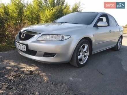 Серый Мазда 6, объемом двигателя 2 л и пробегом 254 тыс. км за 4700 $, фото 1 на Automoto.ua