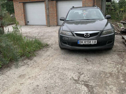 Серый Мазда 6, объемом двигателя 2 л и пробегом 302 тыс. км за 3400 $, фото 1 на Automoto.ua