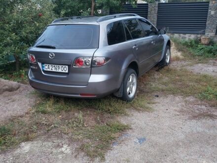 Серый Мазда 6, объемом двигателя 2 л и пробегом 240 тыс. км за 3500 $, фото 1 на Automoto.ua
