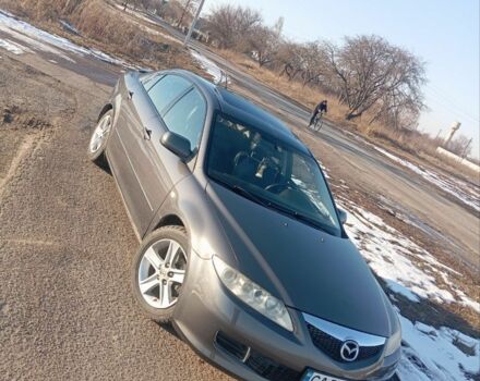 Серый Мазда 6, объемом двигателя 2 л и пробегом 250 тыс. км за 5250 $, фото 1 на Automoto.ua