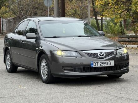 Серый Мазда 6, объемом двигателя 2 л и пробегом 309 тыс. км за 3400 $, фото 1 на Automoto.ua