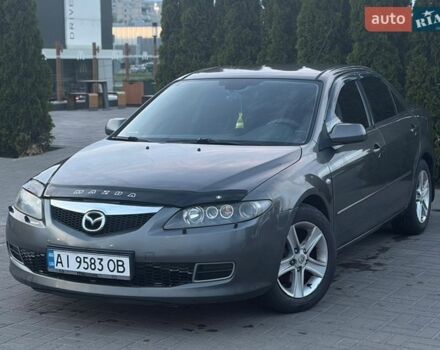 Серый Мазда 6, объемом двигателя 2 л и пробегом 243 тыс. км за 5300 $, фото 1 на Automoto.ua