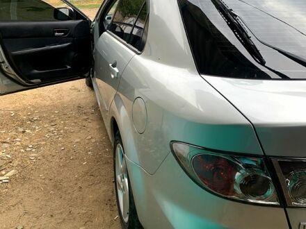 Серый Мазда 6, объемом двигателя 2 л и пробегом 280 тыс. км за 4300 $, фото 1 на Automoto.ua