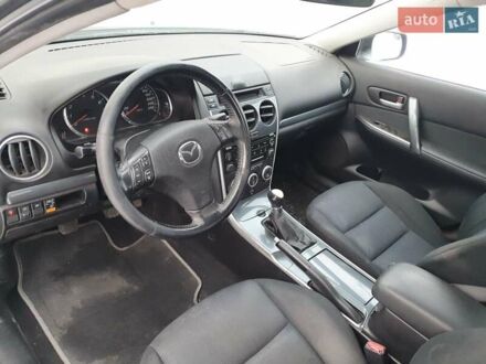 Серый Мазда 6, объемом двигателя 2 л и пробегом 250 тыс. км за 4000 $, фото 1 на Automoto.ua