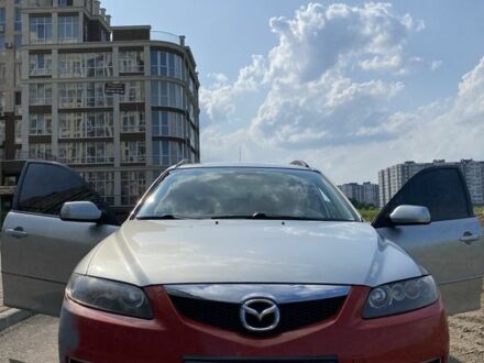 Серый Мазда 6, объемом двигателя 1.8 л и пробегом 217 тыс. км за 3500 $, фото 1 на Automoto.ua