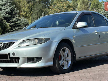 Серый Мазда 6, объемом двигателя 2 л и пробегом 284 тыс. км за 5300 $, фото 1 на Automoto.ua