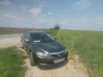 Серый Мазда 6, объемом двигателя 2 л и пробегом 340 тыс. км за 4500 $, фото 1 на Automoto.ua