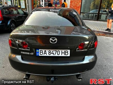 Серый Мазда 6, объемом двигателя 2 л и пробегом 350 тыс. км за 5600 $, фото 1 на Automoto.ua