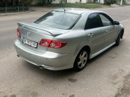 Серый Мазда 6, объемом двигателя 2 л и пробегом 250 тыс. км за 3000 $, фото 1 на Automoto.ua