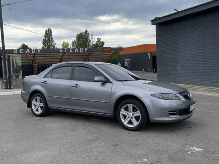 Серый Мазда 6, объемом двигателя 2 л и пробегом 280 тыс. км за 4550 $, фото 1 на Automoto.ua