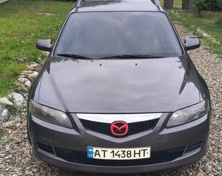 Серый Мазда 6, объемом двигателя 2 л и пробегом 324 тыс. км за 3850 $, фото 1 на Automoto.ua