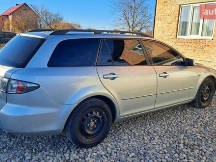 Серый Мазда 6, объемом двигателя 2 л и пробегом 295 тыс. км за 4100 $, фото 1 на Automoto.ua