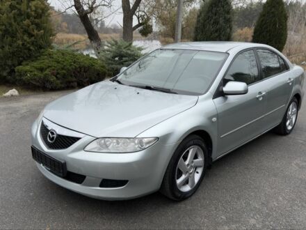 Серый Мазда 6, объемом двигателя 1.8 л и пробегом 249 тыс. км за 3190 $, фото 1 на Automoto.ua