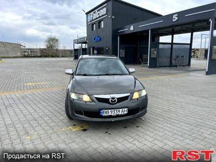 Серый Мазда 6, объемом двигателя 2 л и пробегом 250 тыс. км за 2950 $, фото 1 на Automoto.ua