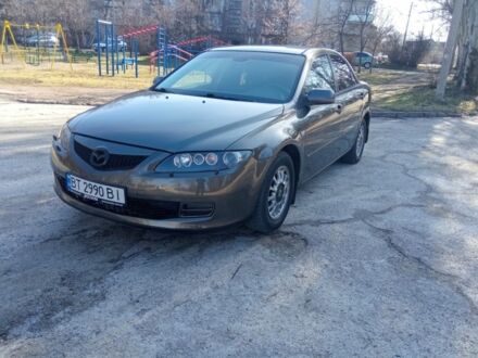 Серый Мазда 6, объемом двигателя 2 л и пробегом 301 тыс. км за 4500 $, фото 1 на Automoto.ua