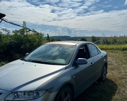Сірий Мазда 6, об'ємом двигуна 2 л та пробігом 300 тис. км за 1799 $, фото 1 на Automoto.ua
