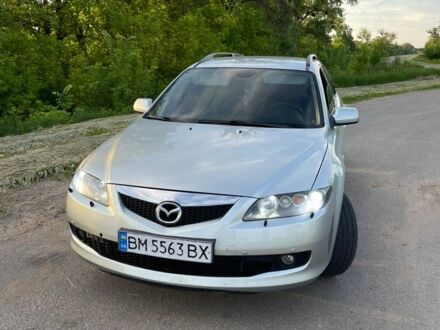Серый Мазда 6, объемом двигателя 2 л и пробегом 290 тыс. км за 5400 $, фото 1 на Automoto.ua