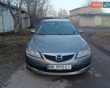 Серый Мазда 6, объемом двигателя 2 л и пробегом 306 тыс. км за 2999 $, фото 1 на Automoto.ua
