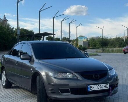 Серый Мазда 6, объемом двигателя 2 л и пробегом 323 тыс. км за 5000 $, фото 1 на Automoto.ua