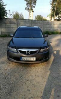 Серый Мазда 6, объемом двигателя 2 л и пробегом 360 тыс. км за 6500 $, фото 1 на Automoto.ua