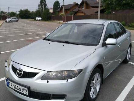 Серый Мазда 6, объемом двигателя 1.8 л и пробегом 231 тыс. км за 5600 $, фото 1 на Automoto.ua