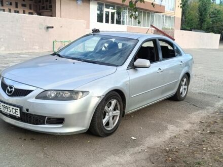 Серый Мазда 6, объемом двигателя 2 л и пробегом 245 тыс. км за 3400 $, фото 1 на Automoto.ua