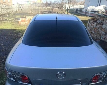 Серый Мазда 6, объемом двигателя 1.9 л и пробегом 270 тыс. км за 3500 $, фото 1 на Automoto.ua