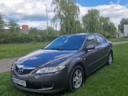 Серый Мазда 6, объемом двигателя 2 л и пробегом 231 тыс. км за 5600 $, фото 1 на Automoto.ua