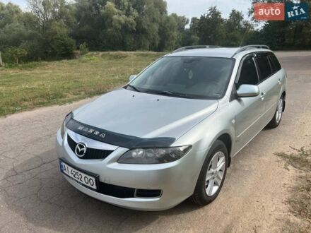 Серый Мазда 6, объемом двигателя 2 л и пробегом 276 тыс. км за 5700 $, фото 1 на Automoto.ua