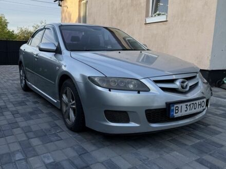 Серый Мазда 6, объемом двигателя 2.3 л и пробегом 200 тыс. км за 3400 $, фото 1 на Automoto.ua