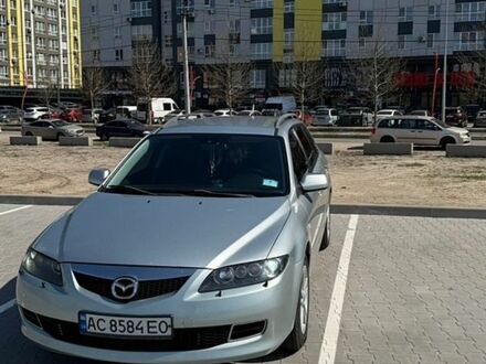 Серый Мазда 6, объемом двигателя 2 л и пробегом 253 тыс. км за 5200 $, фото 1 на Automoto.ua