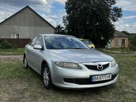 Серый Мазда 6, объемом двигателя 2 л и пробегом 260 тыс. км за 2800 $, фото 1 на Automoto.ua